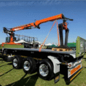 Flat Deck Trailer with Atlas Brick Crane, A Self-Contained Site Lifter